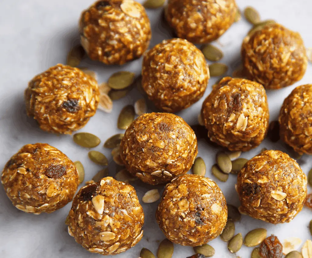 Delicious homemade pumpkin spice energy bites with cinnamon and oats, perfect for a healthy snack