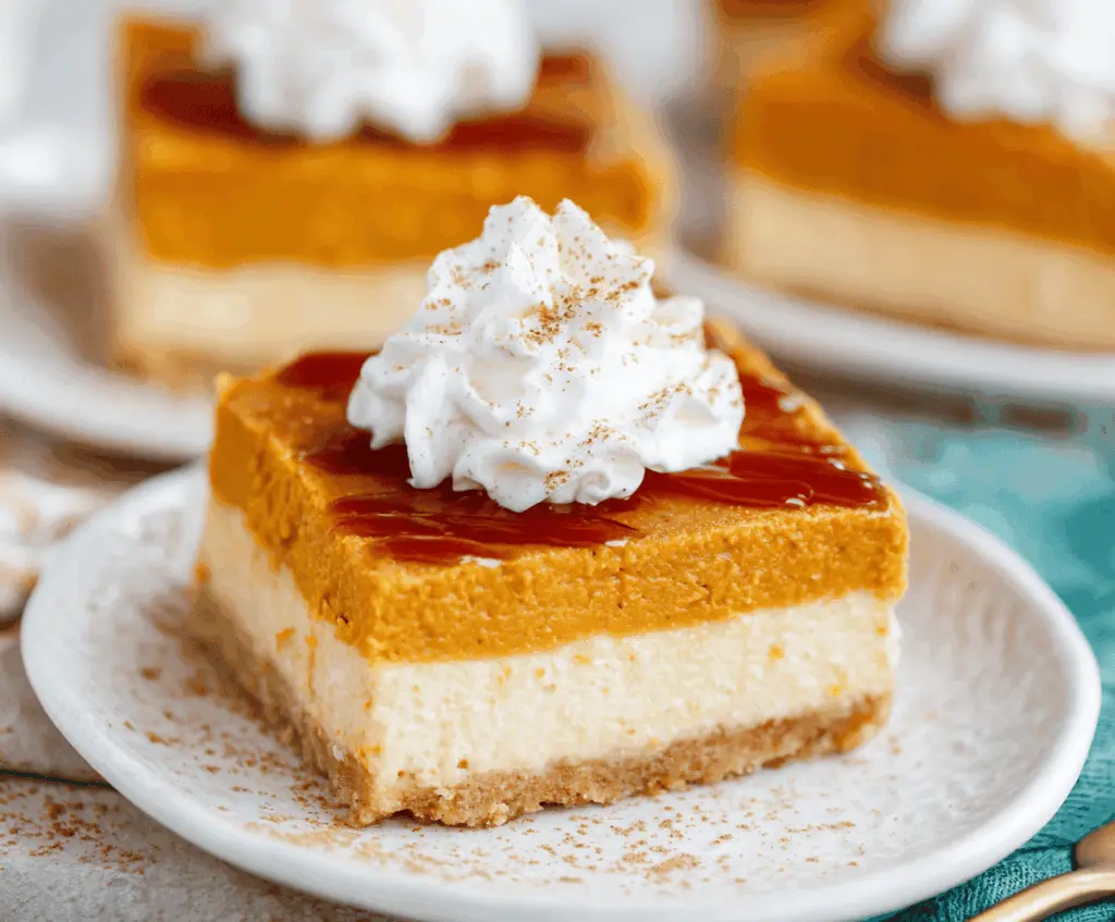 Delicious sweet potato cheesecake bars with a creamy texture and a sweet, spicy topping.